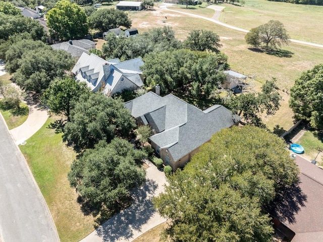 birds eye view of property with a residential view