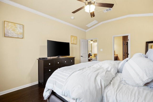 bedroom with baseboards, visible vents, lofted ceiling, dark wood-style floors, and crown molding