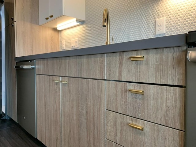 details with modern cabinets and a sink