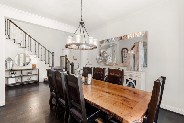 3804 Venezia Vw, Leander, TX 78641 - dining space featuring a chandelier, ornamental molding, stairs, and dark wood finished floors