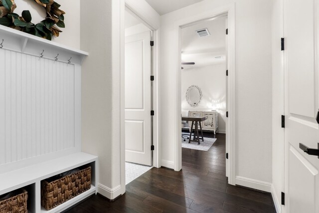 3804 Venezia Vw, Leander, TX 78641 - mudroom with dark wood-type flooring and baseboards