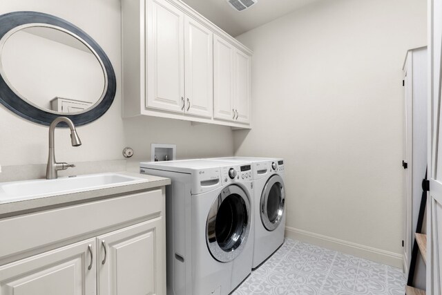 3804 Venezia Vw, Leander, TX 78641 - laundry area with cabinet space and independent washer and dryer