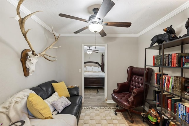 living area featuring ornamental molding and light floors