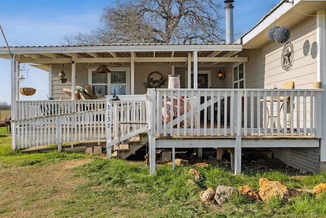 property entrance with a wooden deck