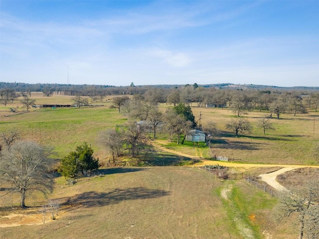 birds eye view of property featuring a rural view