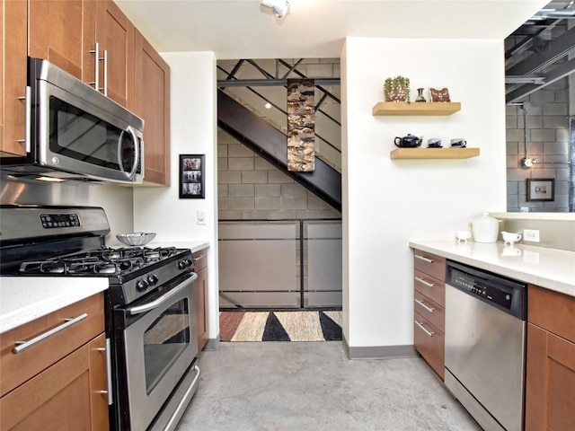 4801 S Congress Ave Unit L4, Austin, TX 78745 - kitchen featuring stainless steel appliances, concrete floors, brown cabinetry, light countertops, and open shelves