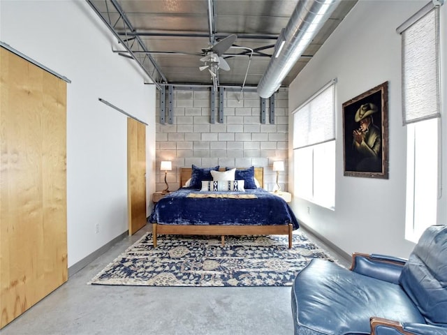 4801 S Congress Ave Unit L4, Austin, TX 78745 - bedroom featuring concrete flooring and baseboards