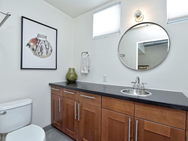 4801 S Congress Ave Unit L4, Austin, TX 78745 - bathroom with vanity and toilet