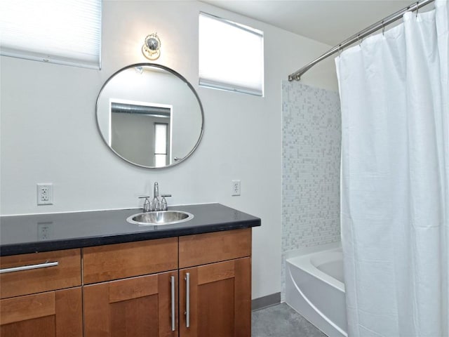 full bath with concrete flooring, shower / tub combo, and vanity