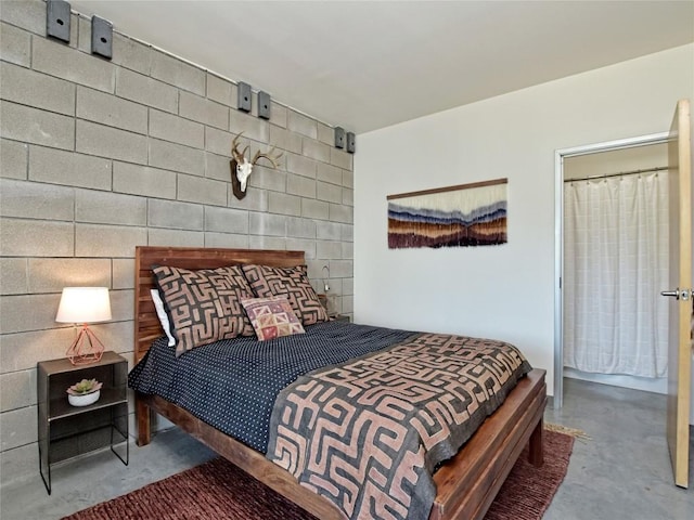4801 S Congress Ave Unit L4, Austin, TX 78745 - bedroom with concrete flooring