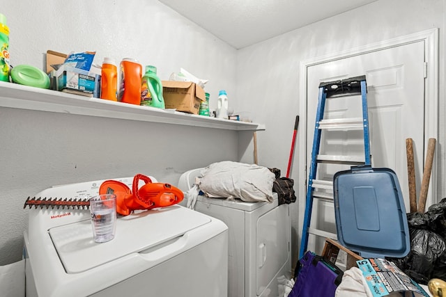 laundry room with laundry area and separate washer and dryer