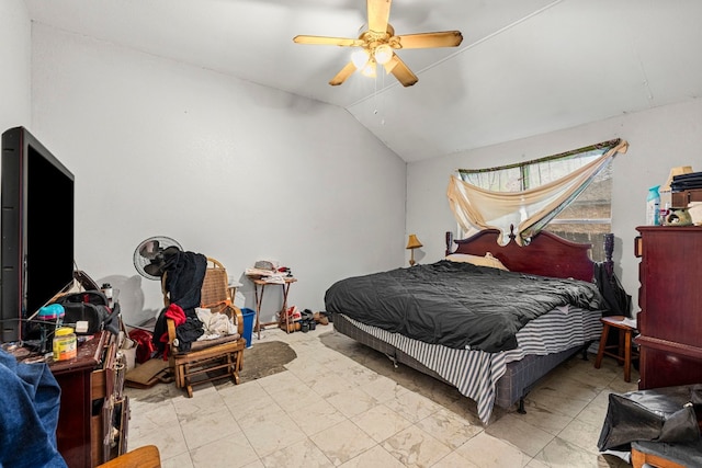 bedroom with vaulted ceiling and a ceiling fan