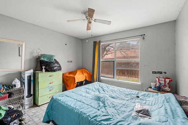 bedroom featuring ceiling fan