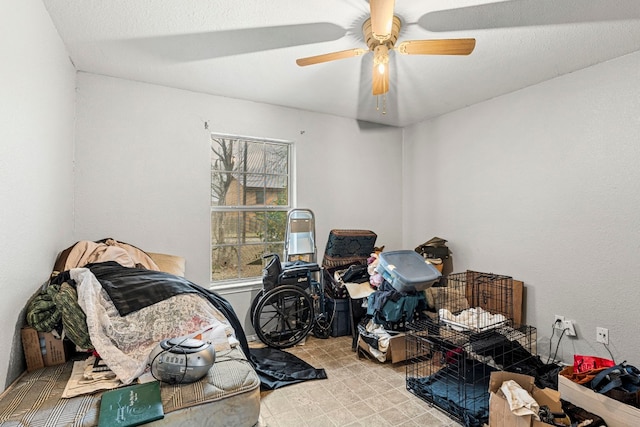 interior space featuring ceiling fan