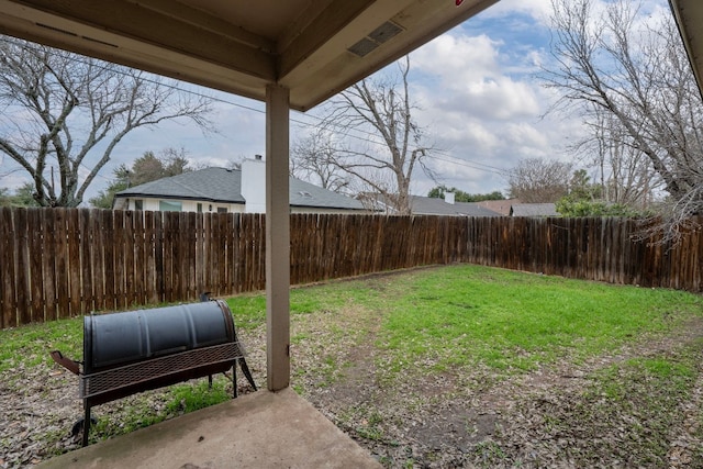 view of yard featuring a fenced backyard