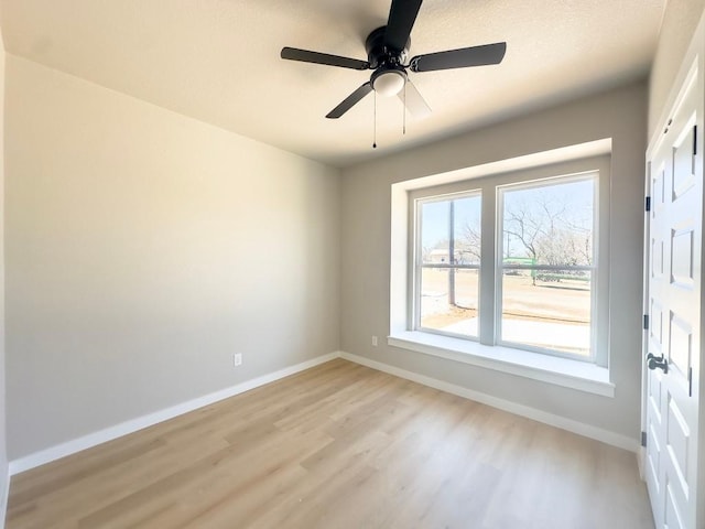 849 Cypress Ln, Cottonwood Shores, TX 78657 - spare room featuring light wood-style flooring and ceiling fan