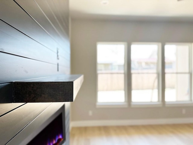 849 Cypress Ln, Cottonwood Shores, TX 78657 - detailed view of baseboards and wood finished floors