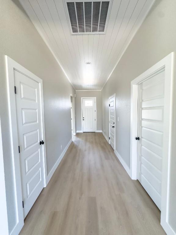 849 Cypress Ln, Cottonwood Shores, TX 78657 - hall with light wood-type flooring and wooden ceiling