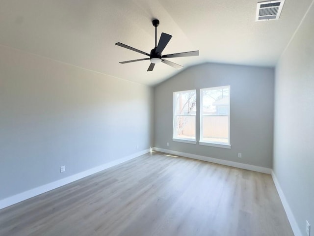 849 Cypress Ln, Cottonwood Shores, TX 78657 - empty room with light wood finished floors, lofted ceiling, and ceiling fan