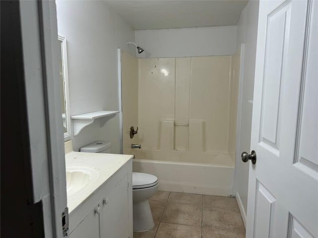 full bath featuring tile patterned floors, vanity, and bathing tub / shower combination