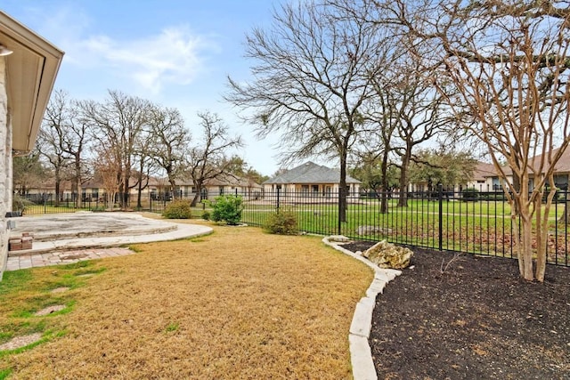 view of yard with fence and a residential view