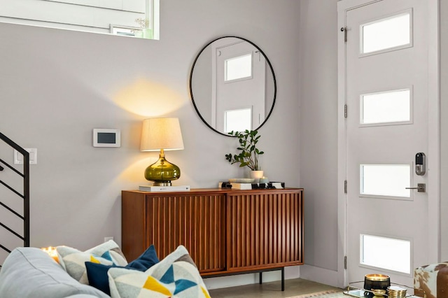 entryway with stairs and plenty of natural light