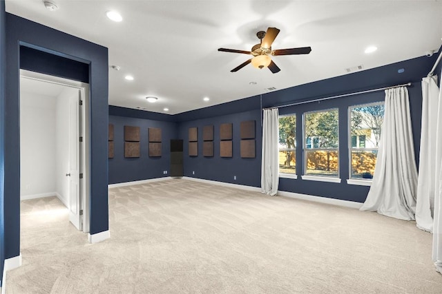 unfurnished room featuring carpet, visible vents, baseboards, and recessed lighting