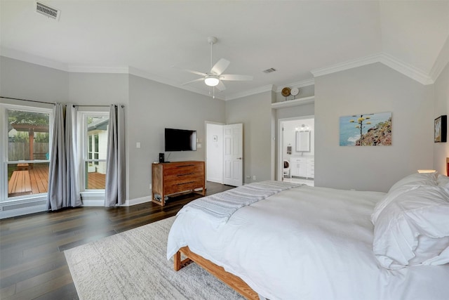 bedroom with dark wood-style floors, vaulted ceiling, visible vents, and crown molding