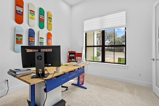 carpeted office with baseboards