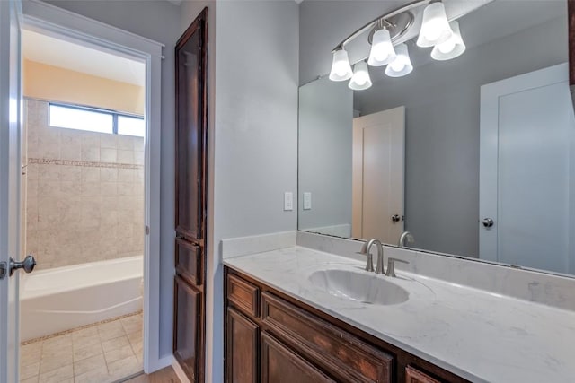 bathroom featuring shower / bath combination, vanity, and tile patterned floors