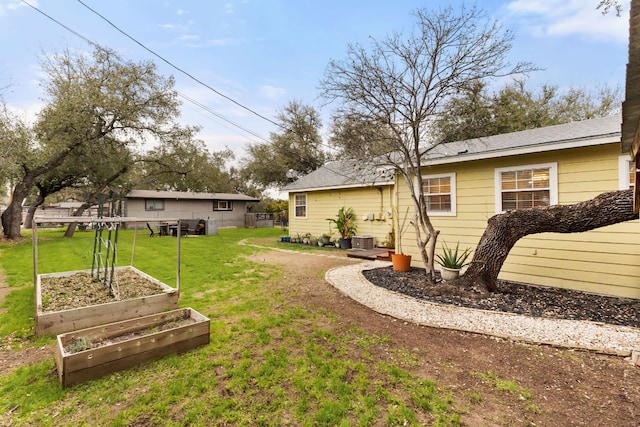 1143 Dawnridge Dr, Canyon Lake, TX 78133 - view of grassy yard with a garden
