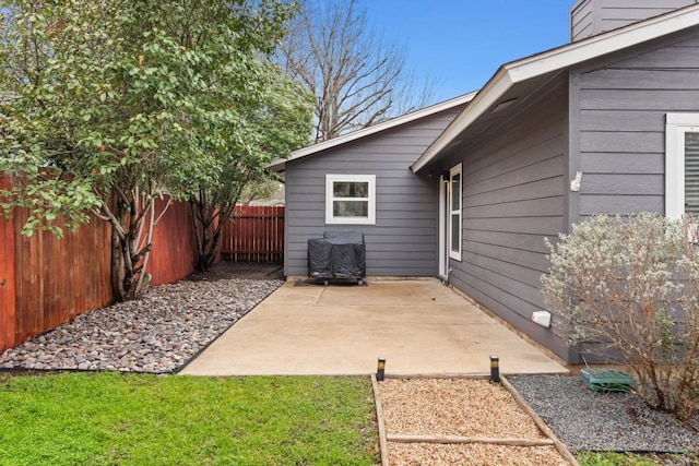 12807 Covington Trl, Austin, TX 78727 - fenced backyard with a patio