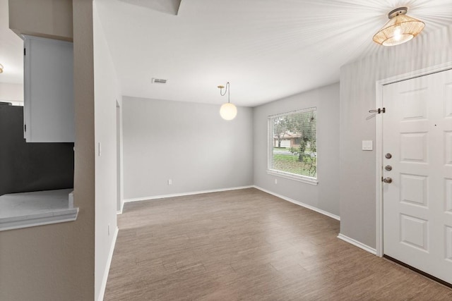 12807 Covington Trl, Austin, TX 78727 - entryway with wood finished floors and baseboards