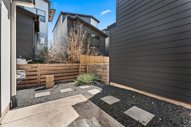 view of patio / terrace featuring fence