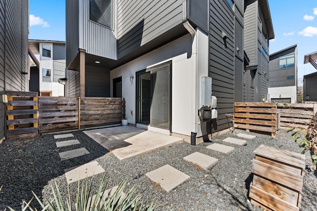 view of patio / terrace featuring fence