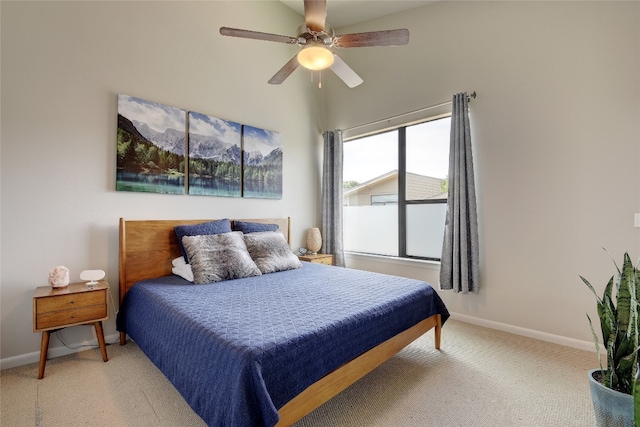 bedroom featuring ceiling fan, carpet floors, and baseboards