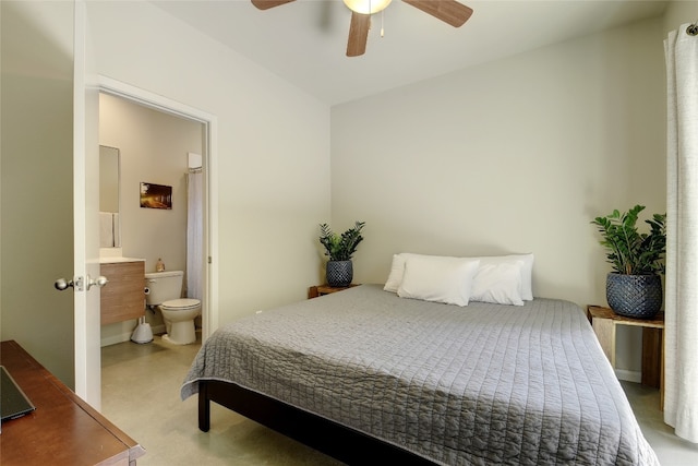 bedroom featuring a ceiling fan and connected bathroom