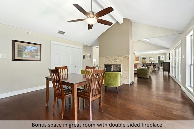 9903 Richelieu Rd, Austin, TX 78750 - dining room featuring visible vents, a fireplace, beamed ceiling, ceiling fan, and dark wood finished floors