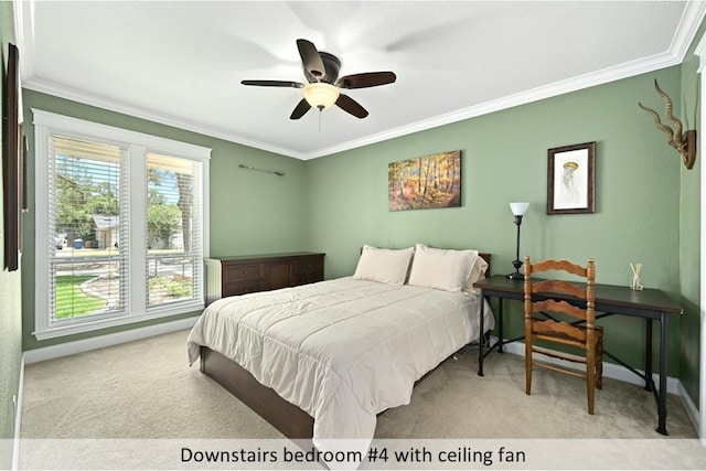 9903 Richelieu Rd, Austin, TX 78750 - carpeted bedroom with crown molding, baseboards, and ceiling fan