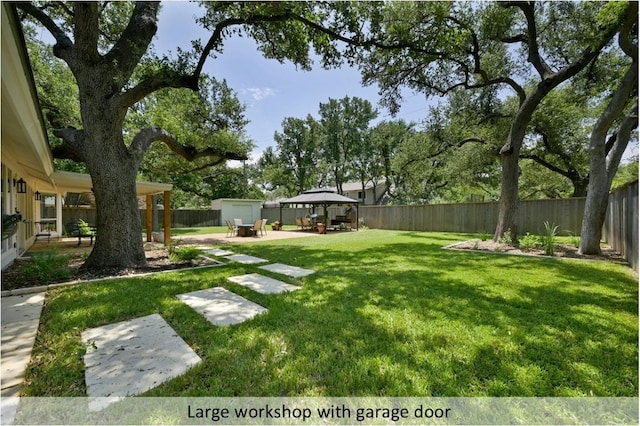 9903 Richelieu Rd, Austin, TX 78750 - view of yard featuring a gazebo, a fenced backyard, a patio area, and a storage unit