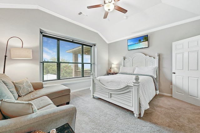 carpeted bedroom with crown molding, baseboards, lofted ceiling, and visible vents