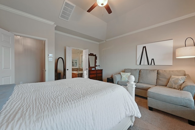 carpeted bedroom with a ceiling fan, vaulted ceiling, ornamental molding, and visible vents