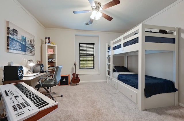 bedroom with crown molding, carpet floors, ceiling fan, and visible vents