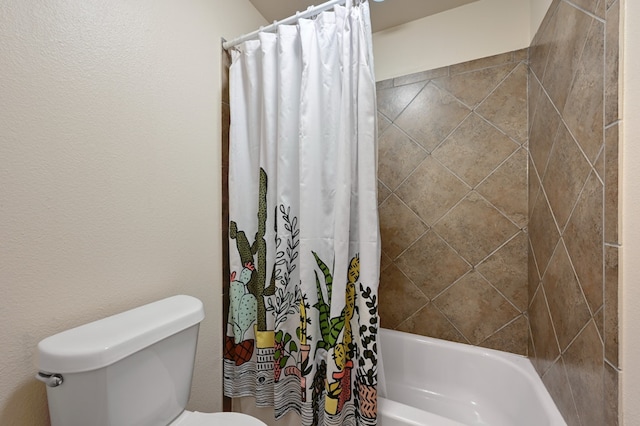 bathroom with toilet and shower / bath combination with curtain