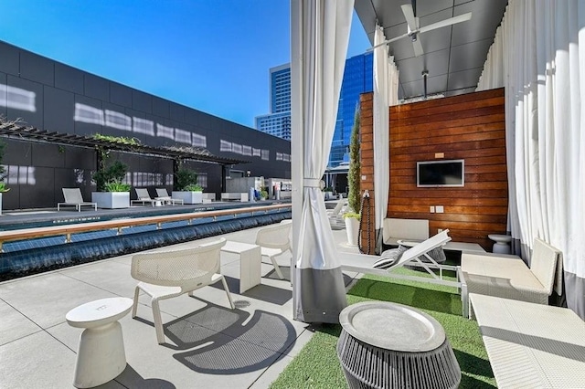 view of patio / terrace with a community pool