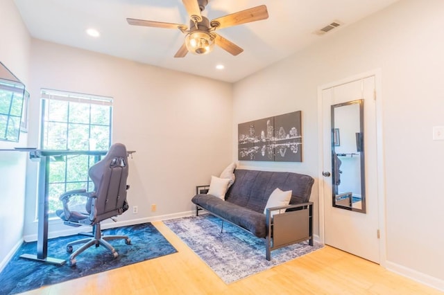 office with recessed lighting, visible vents, baseboards, and wood finished floors