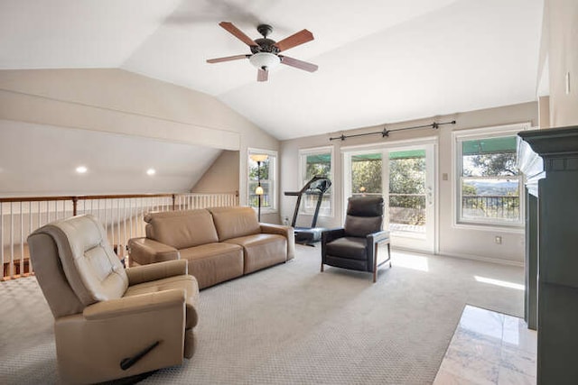 living room with lofted ceiling, carpet, and ceiling fan