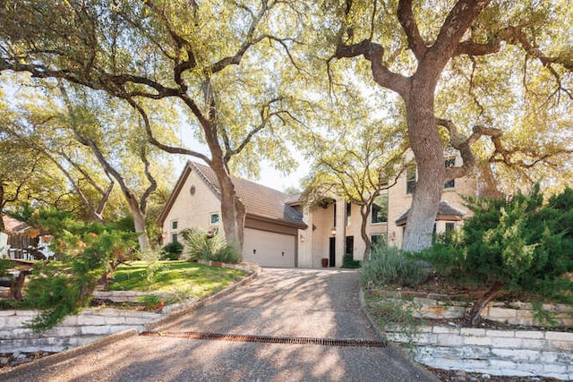 view of front of house with a garage and driveway