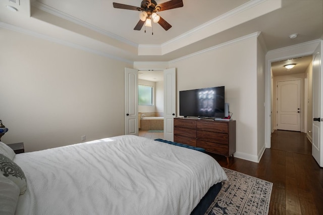 bedroom with ornamental molding, wood-type flooring, a raised ceiling, and baseboards