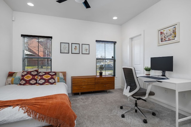 carpeted bedroom with ceiling fan and recessed lighting